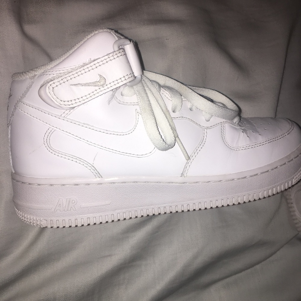 All white Air Force 1s Jordan’s